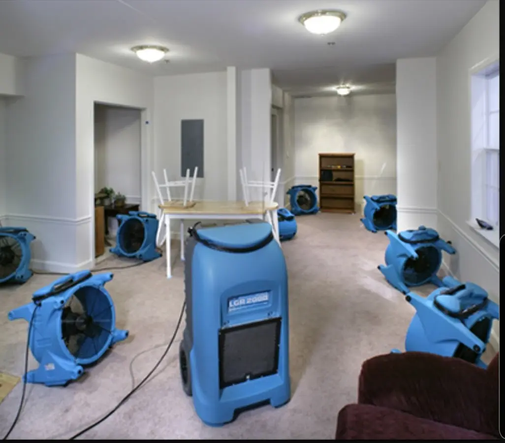 Air movers and dehumidifier setup for Water Damage Restoration in Wheeling